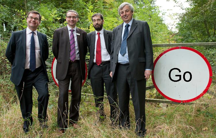 East West Rail is GO! as VIPs (including MP and DfT representative) stand in front of 'GO' (rather than 'Stop') sign on the mothballed route east of Claydon Junction. This photo was taken after they alighted from a Chiltern Railways special train to promote the reopening